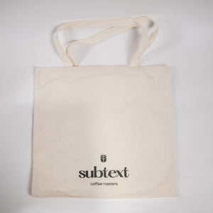 
                  
                    Load image into Gallery viewer, Printed Cotton Tote: &amp;quot;Drink Subtext Coffee&amp;quot;
                  
                