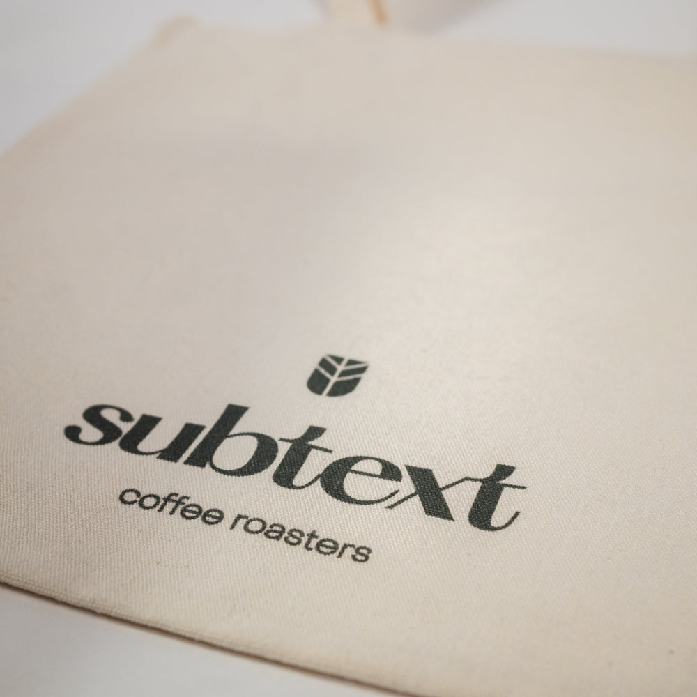 
                  
                    Load image into Gallery viewer, Printed Cotton Tote: &amp;quot;Drink Subtext Coffee&amp;quot;
                  
                