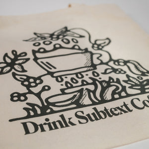 
                  
                    Load image into Gallery viewer, Printed Cotton Tote: &amp;quot;Drink Subtext Coffee&amp;quot;
                  
                